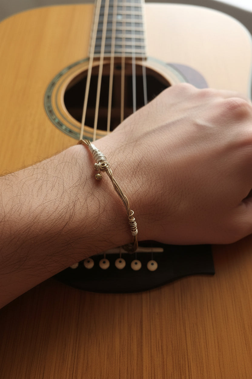 Guitar string bracelet 7.5cm diameter