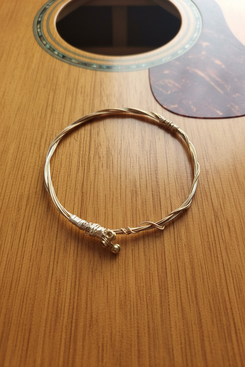 Guitar string bracelet 7.5cm diameter
